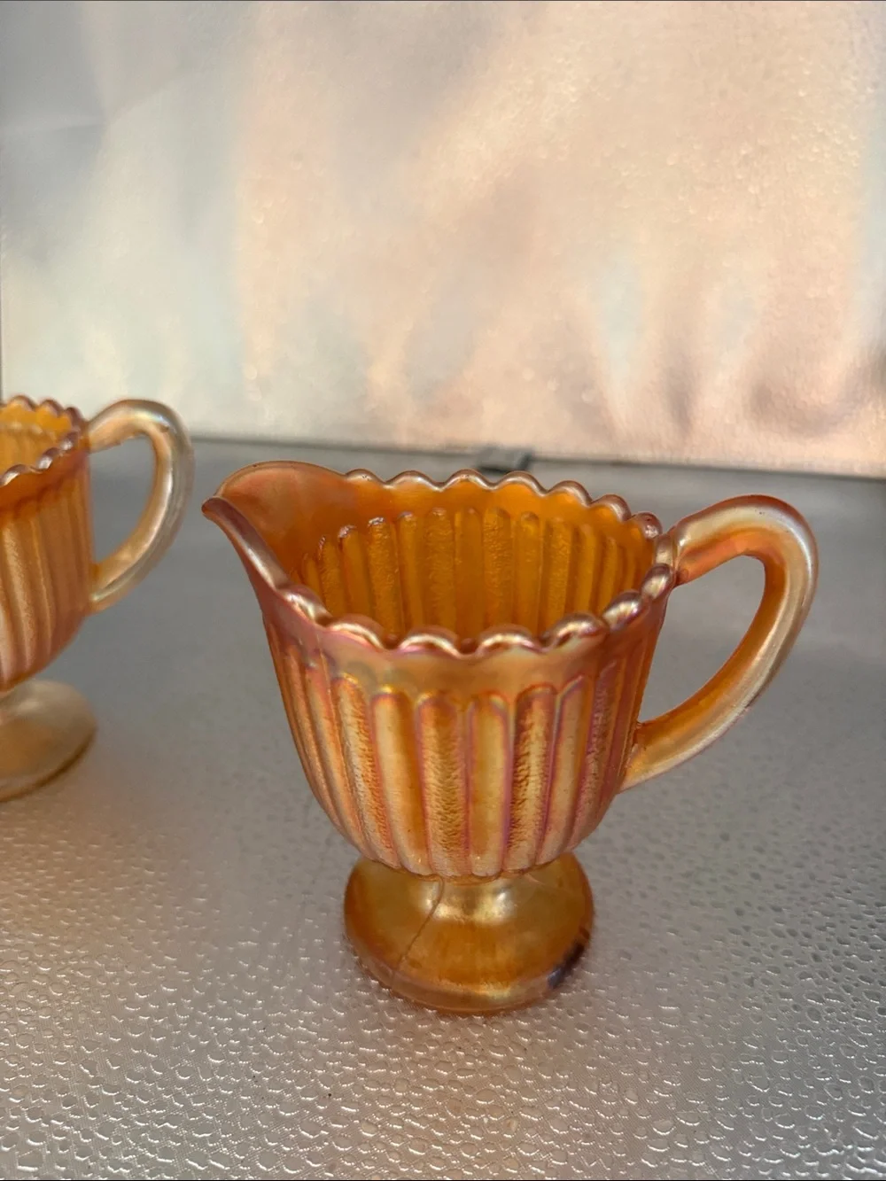 Vintage “Striped Rays” Carnival Glass sugar and creamer set.